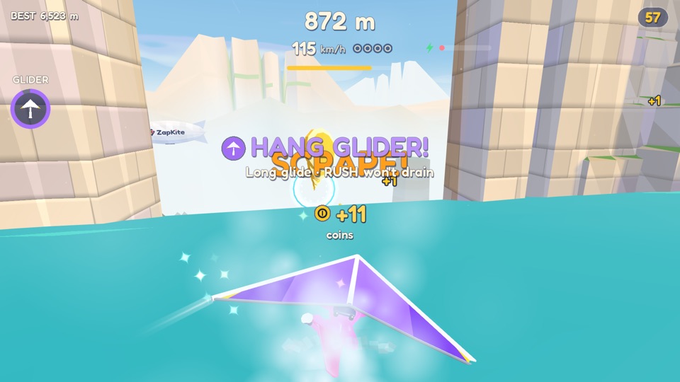 A HANG GLIDER skims the Sea Stacks